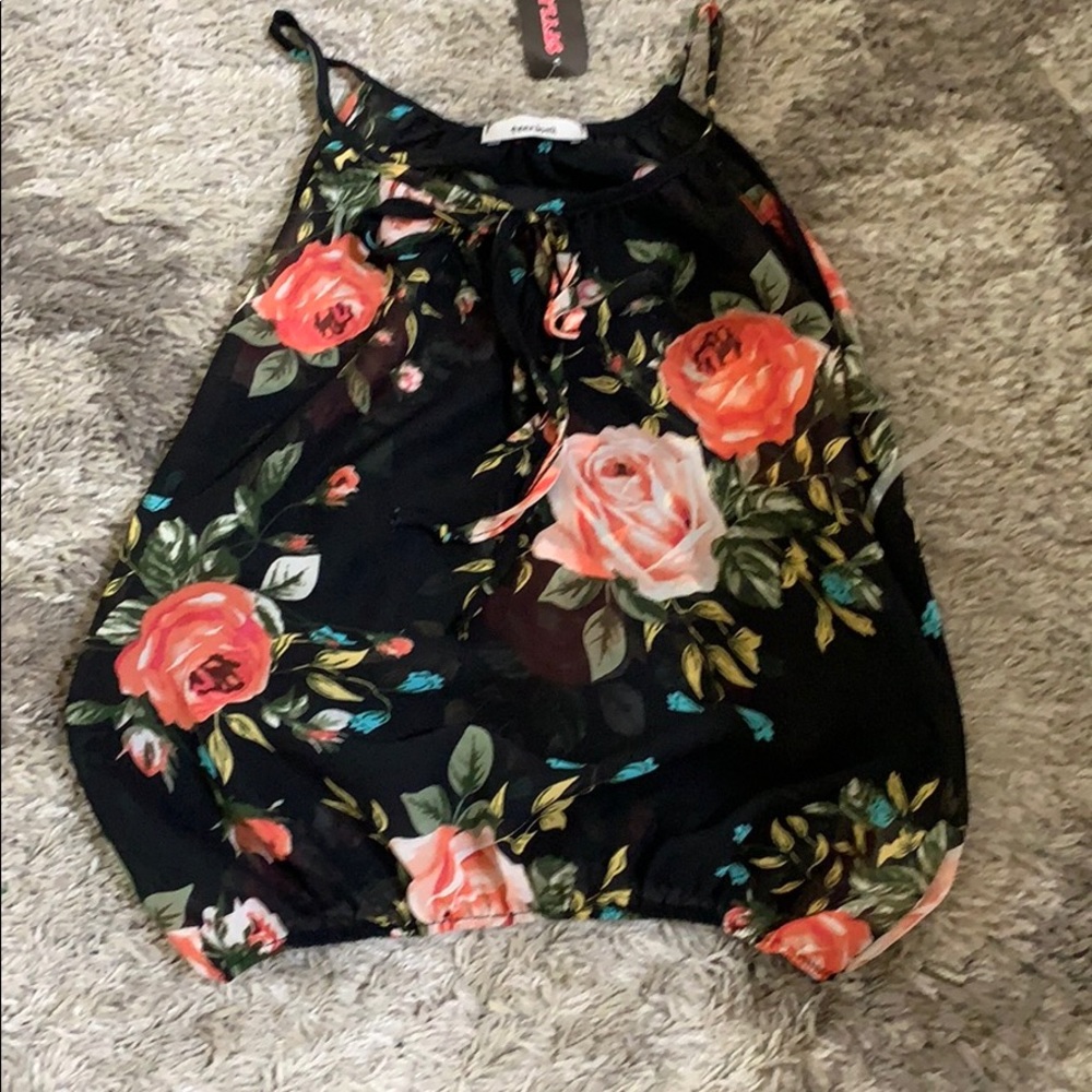 Black top with floral design